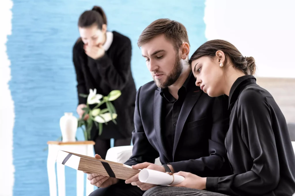 A couple grieving the loss of a loved one.